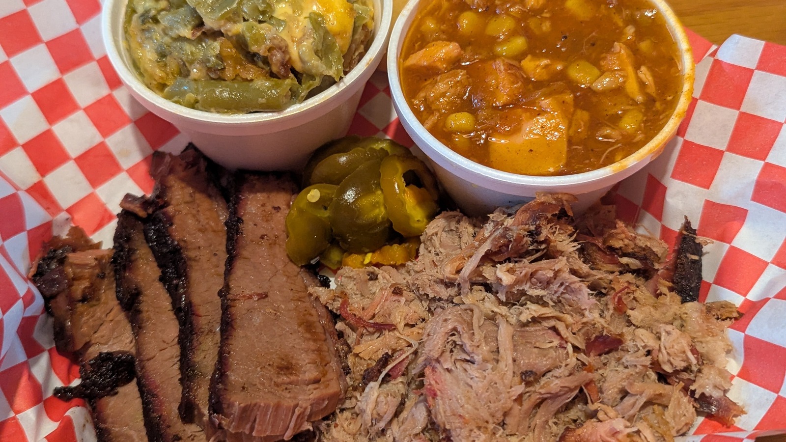 Brisket and pulled pork combo plate with green bean casserole and Brunswick stew at JD's Smokehouse