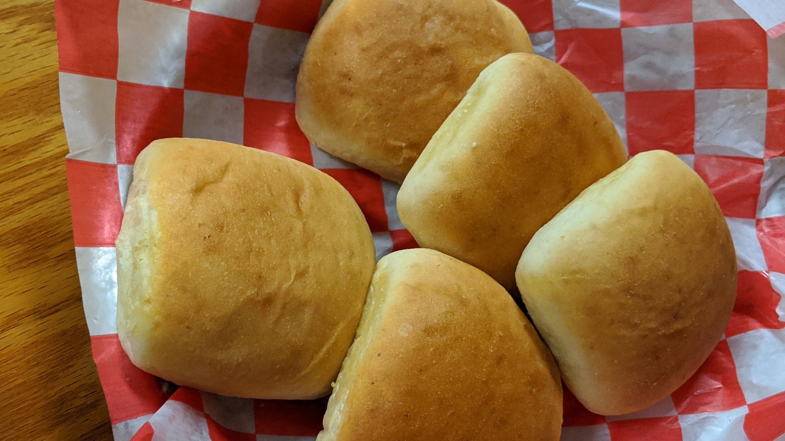 Basket of soft bread rolls at JD's Smokehouse