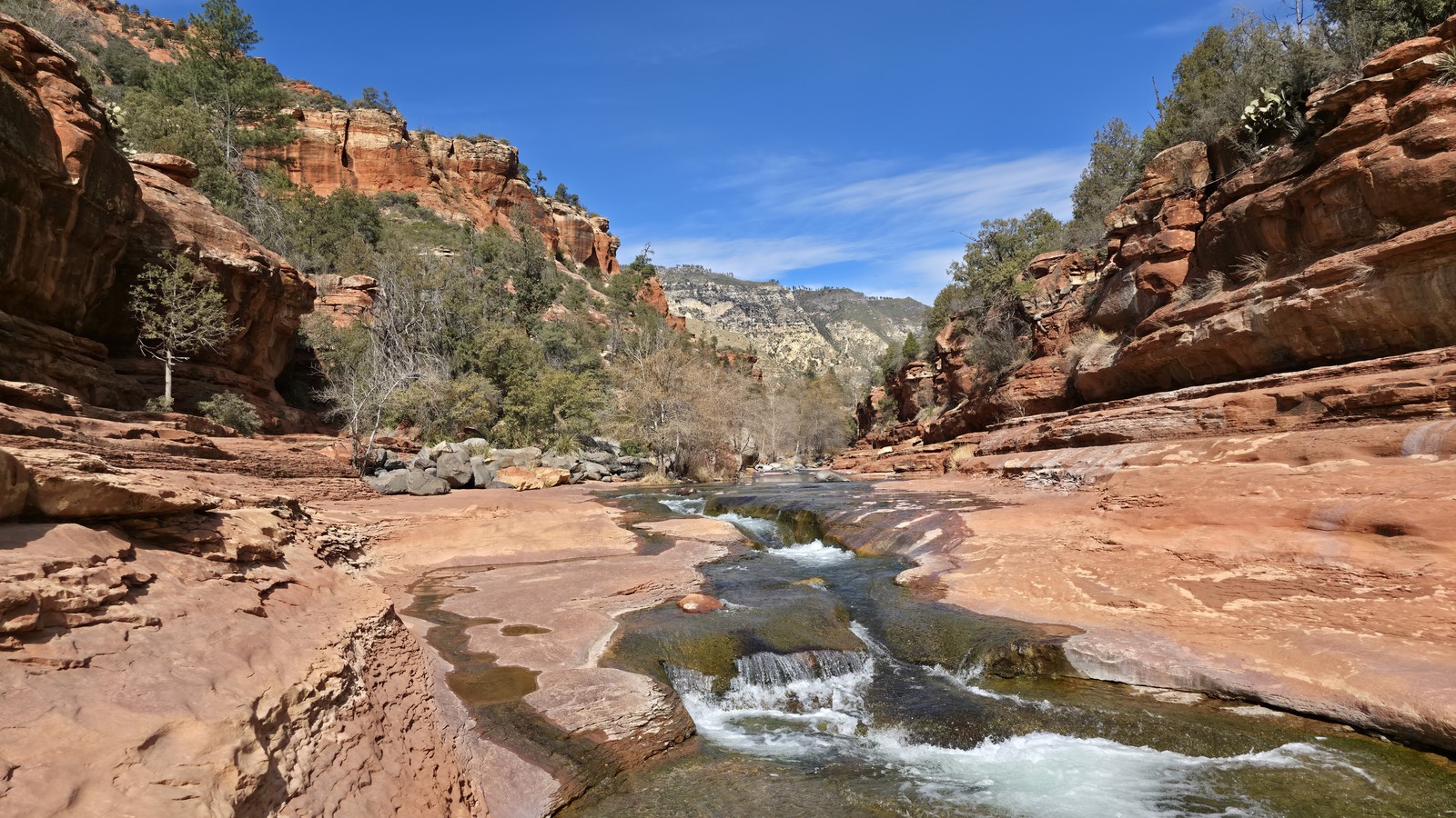 This 43-Acre Arizona State Park Hides A Historic Apple Farm Beneath Red Rock Cliffs