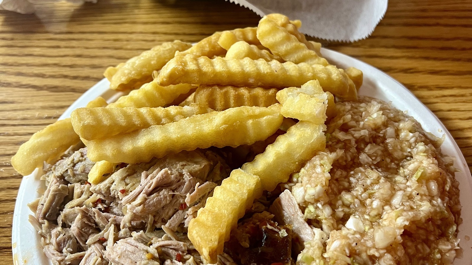 Barbecue plate with crinkle fries and red slaw at Lexington Barbecue