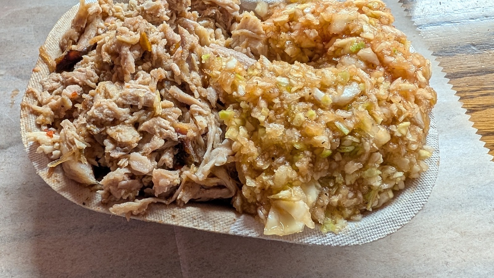 Chopped pork and red slaw tray on butcher paper at Lexington Barbecue