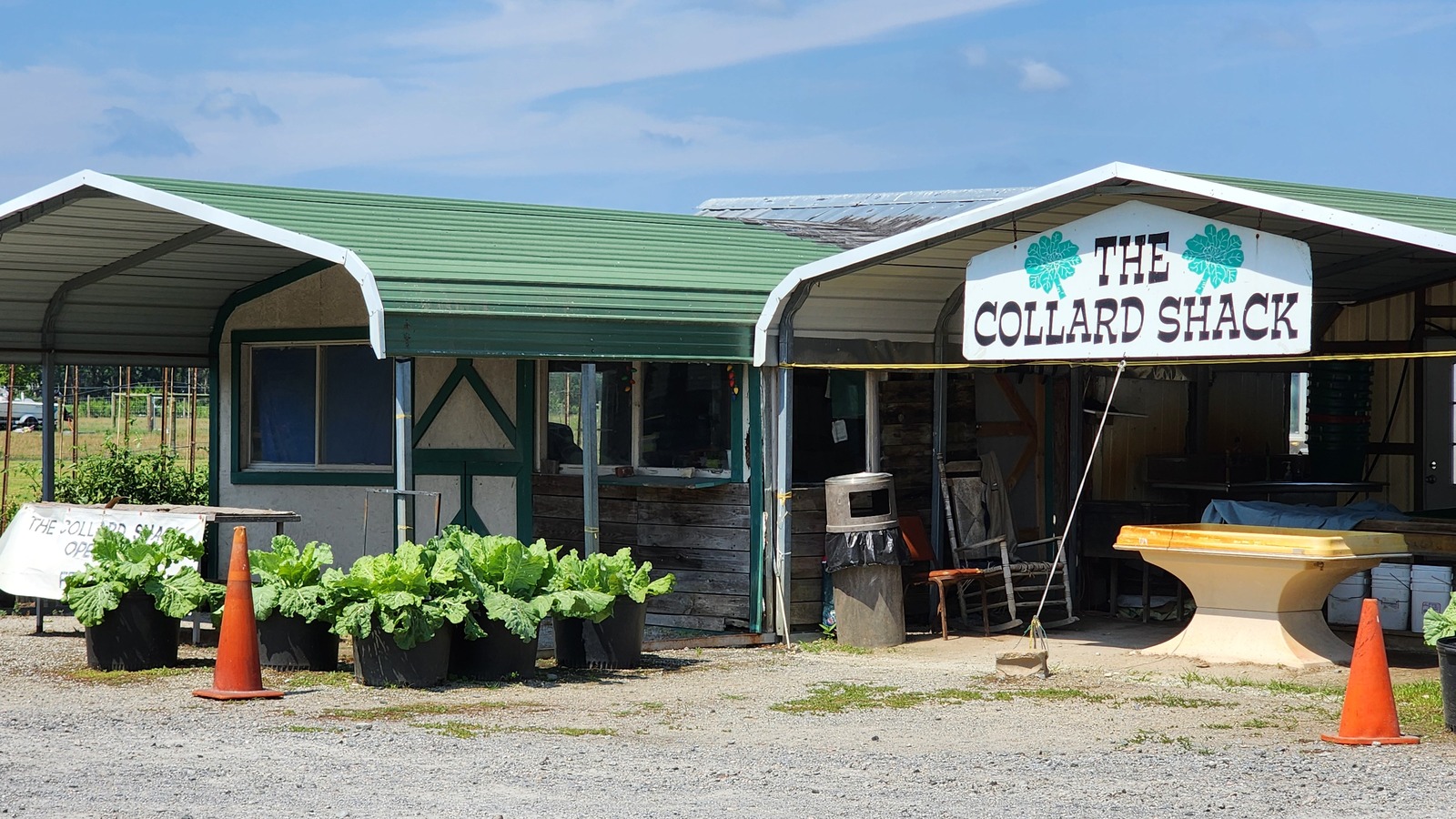 The Collard Shack outbuilding beside Skylight Inn BBQ under a wide eastern North Carolina sky