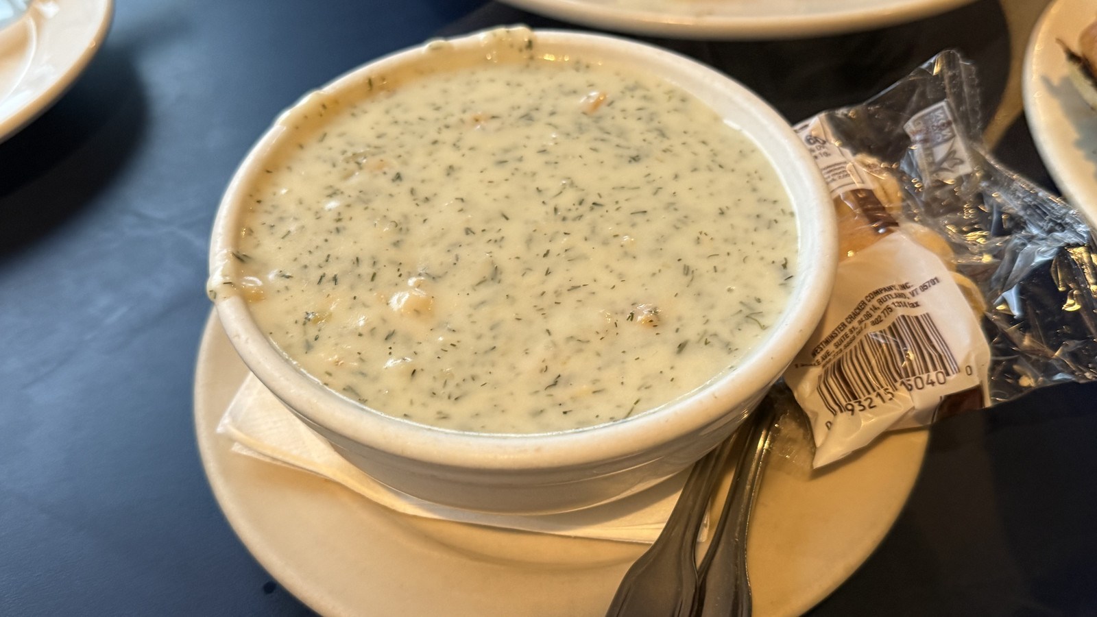 thick bowl of New England clam chowder at Boston Sail Loft