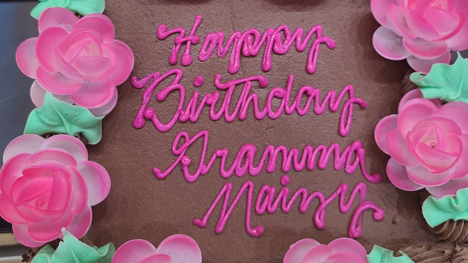 Pink birthday message cake from Weber's Bakery