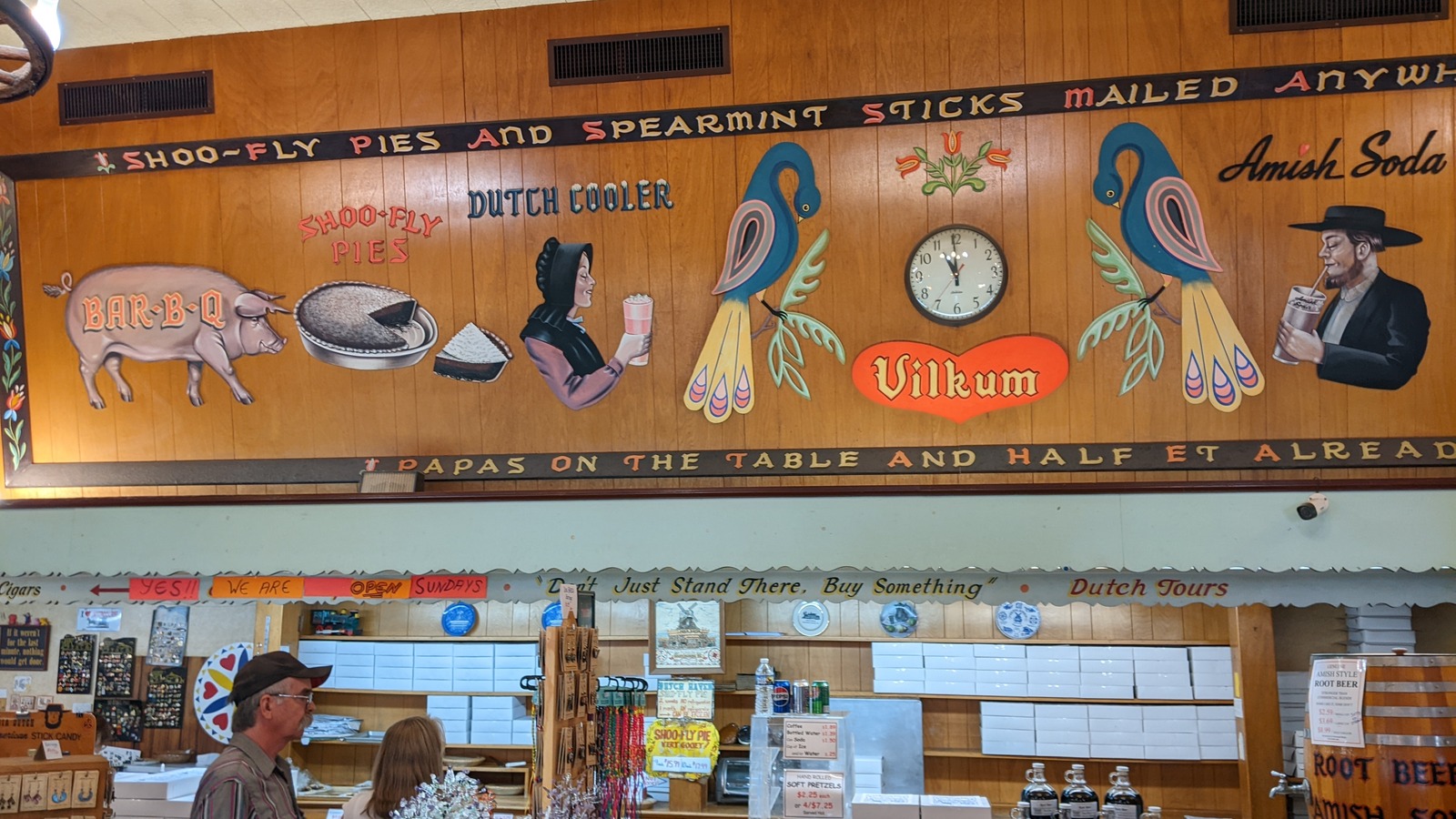 Painted Dutch Haven mural featuring shoo-fly pie, Dutch cooler, and folk motifs.