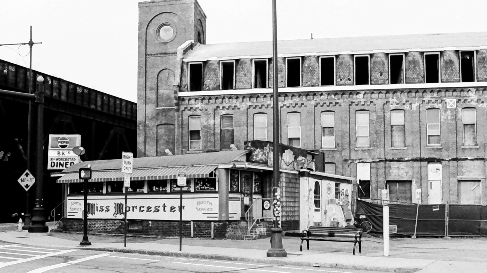 Miss Worcester Diner set against the old brick factory buildings across the street