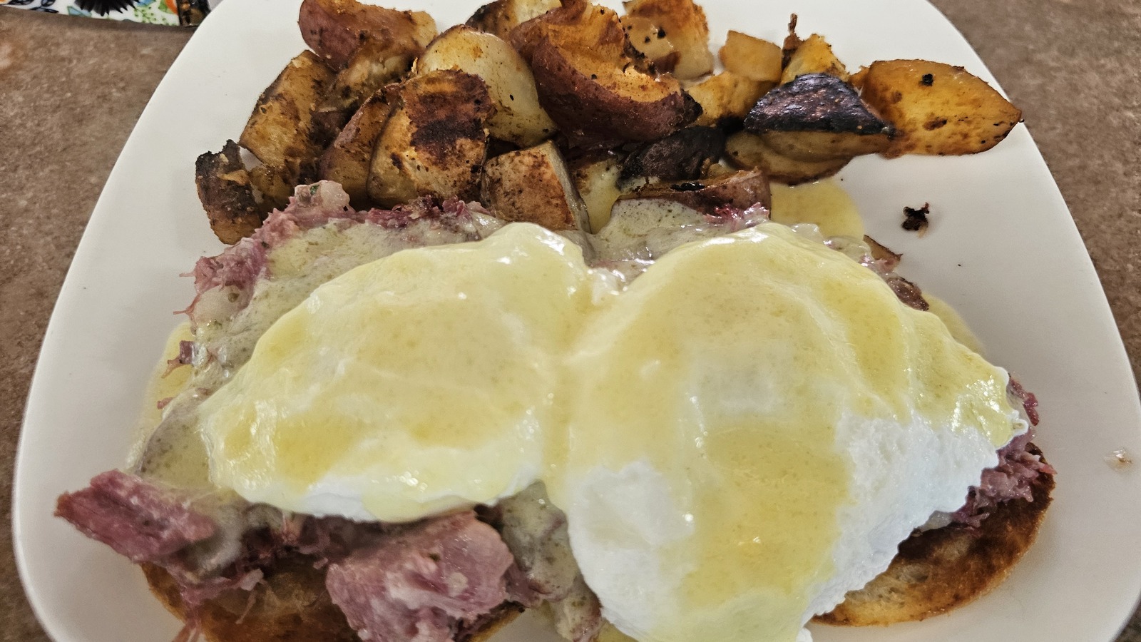 Corned beef hash with poached eggs and home fries at Miss Worcester Diner