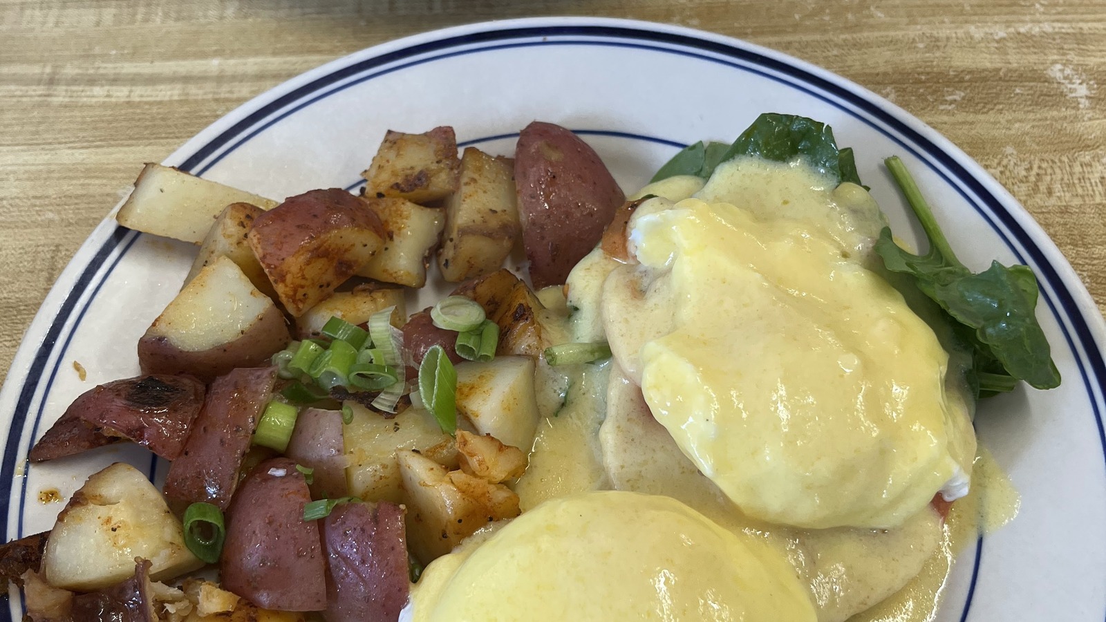 Eggs Benedict with home fries at Miss Worcester Diner