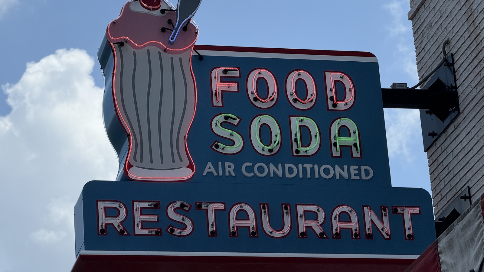 Glowing Food Soda Restaurant sign outside Elliston Place Soda Shop in Nashville