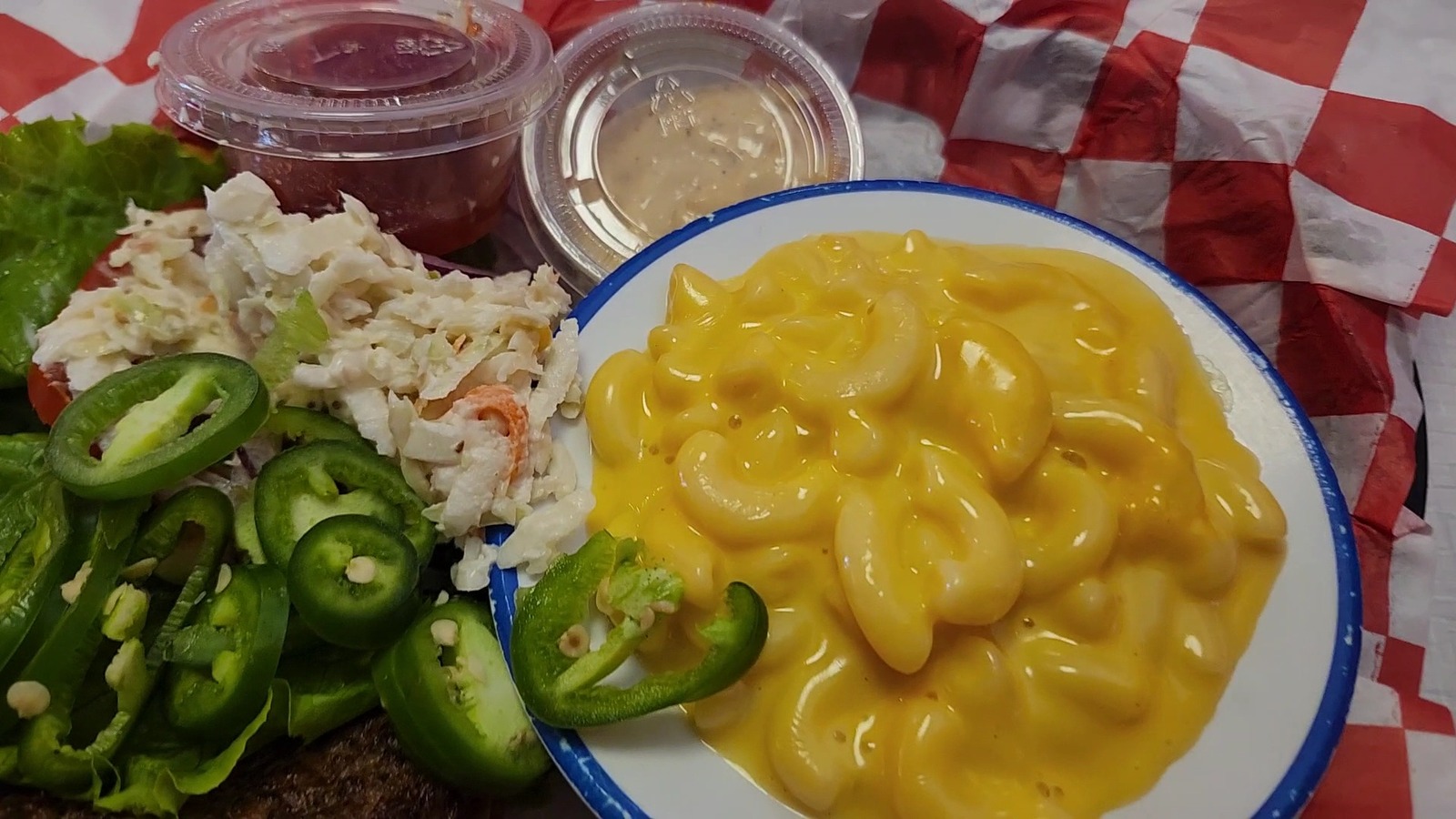 Mac and cheese, slaw, and sliced jalapenos served with a meat-and-three plate at Elliston Place Soda Shop