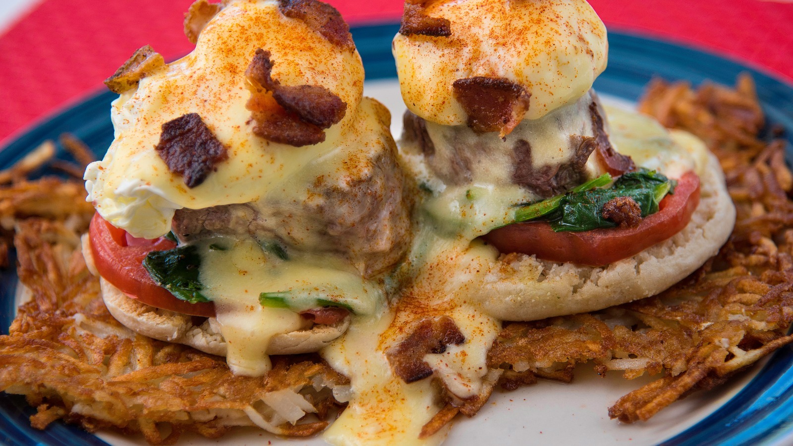 A biscuit-topped breakfast plate with hollandaise and crisp hash browns at Doo-Dah Diner
