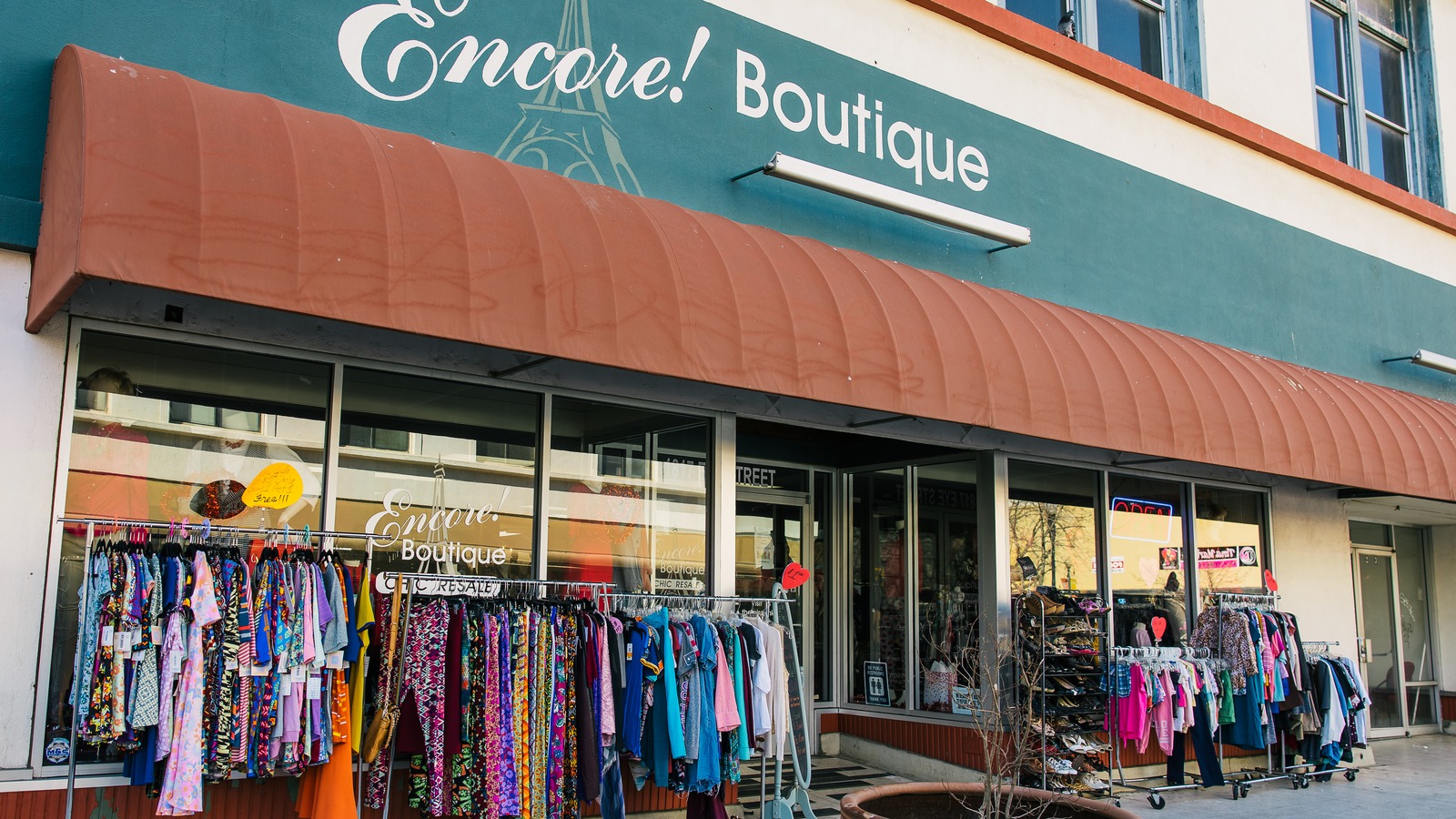 Encore! Boutique storefront with clothing racks in downtown Bakersfield