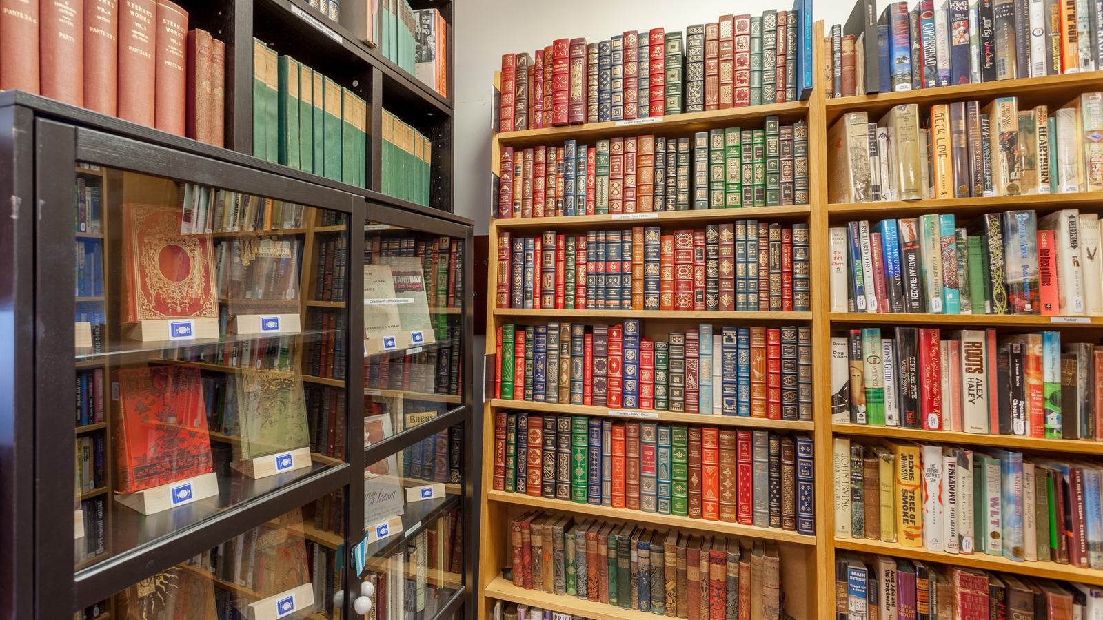 Tall shelves of colorful used books inside Blue Plate Books in Winchester