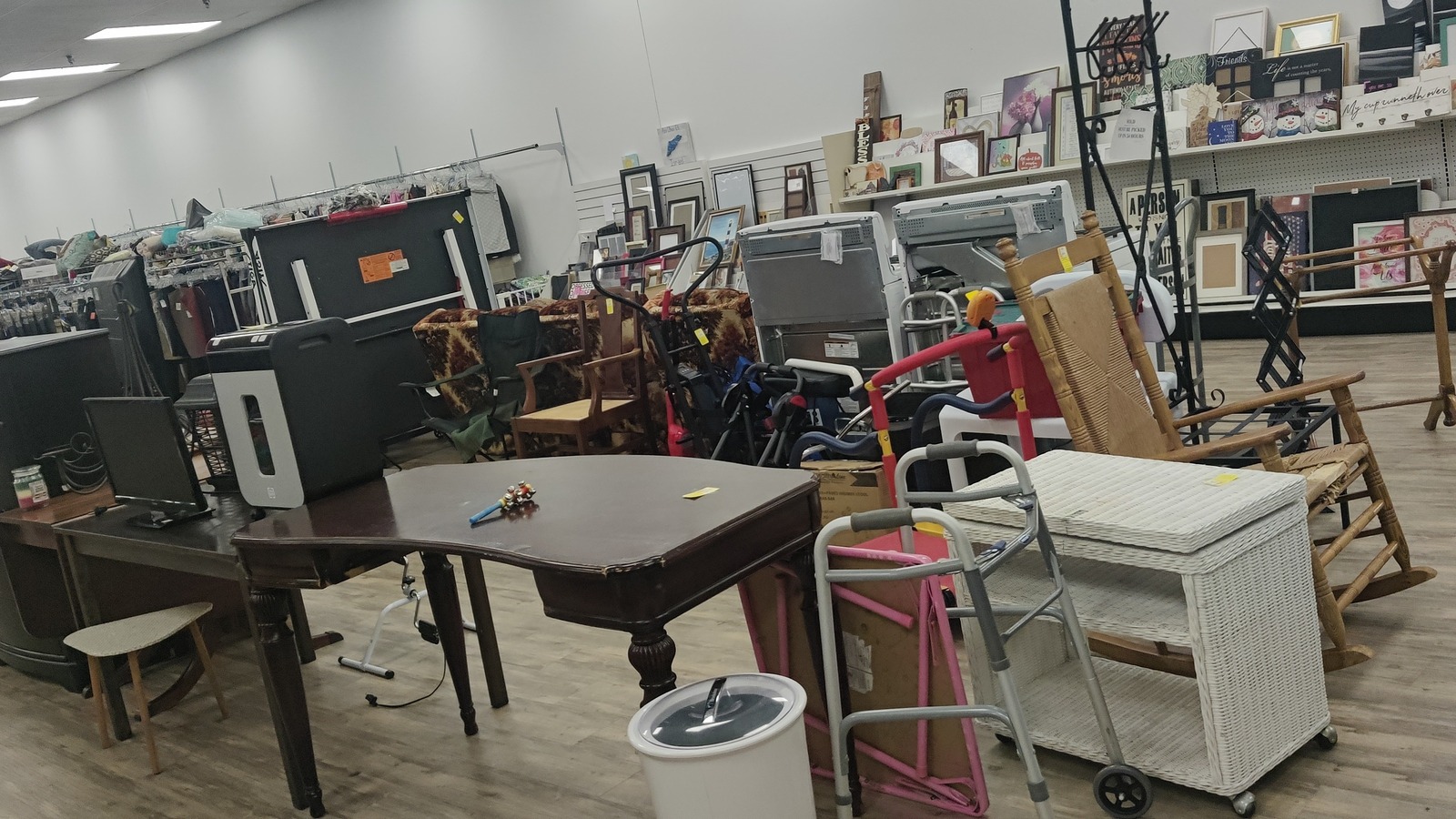 Furniture section with tables and chairs inside Horizon Goodwill Retail Store in Winchester