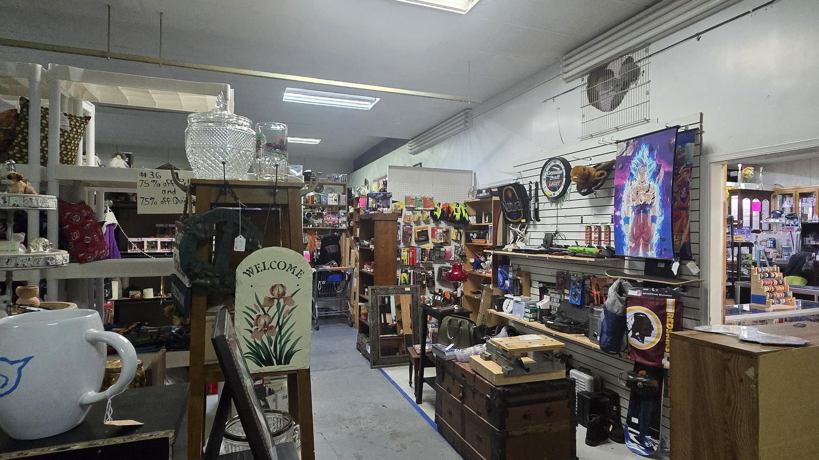 Packed aisles of collectibles and decor inside Precious Treasures in Winchester