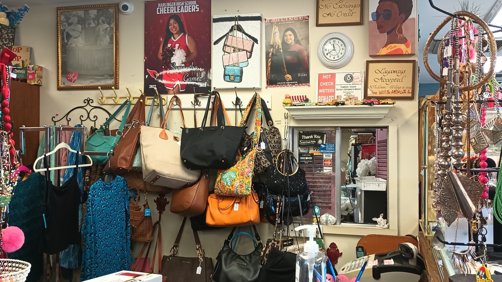 Handbags, dresses, and boutique displays inside Silent Re-Run Ladies Clothing in Harlingen