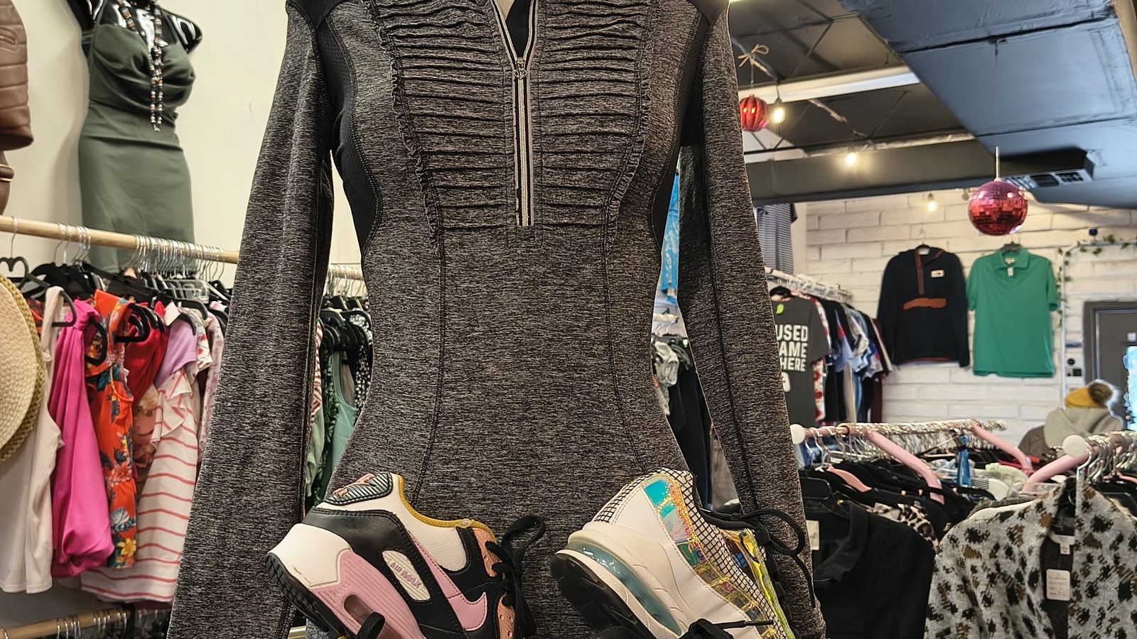 Curated fashion aisle inside Luv Story Boutique in Harlingen
