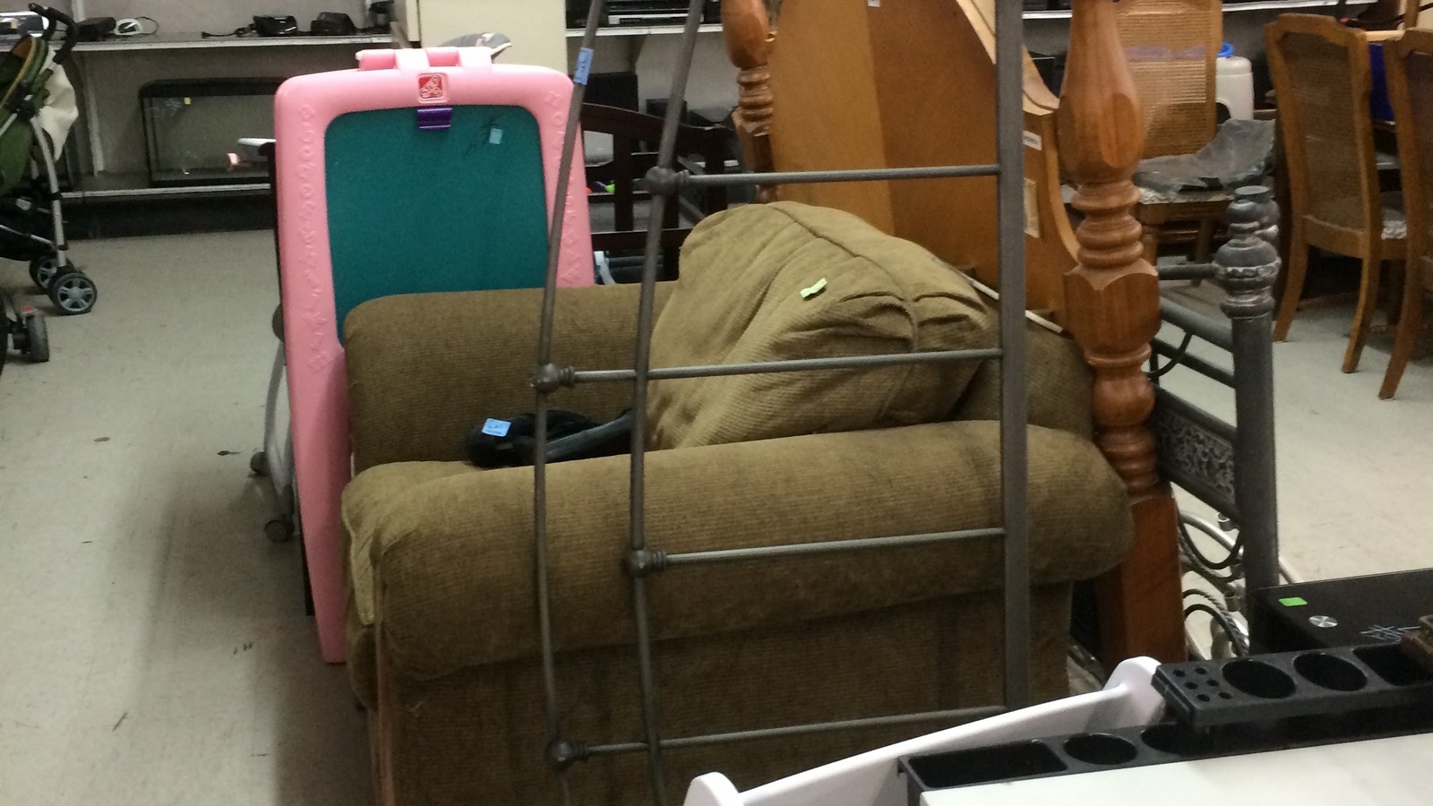 Furniture corner with chairs and accent pieces inside Community Thrift Store