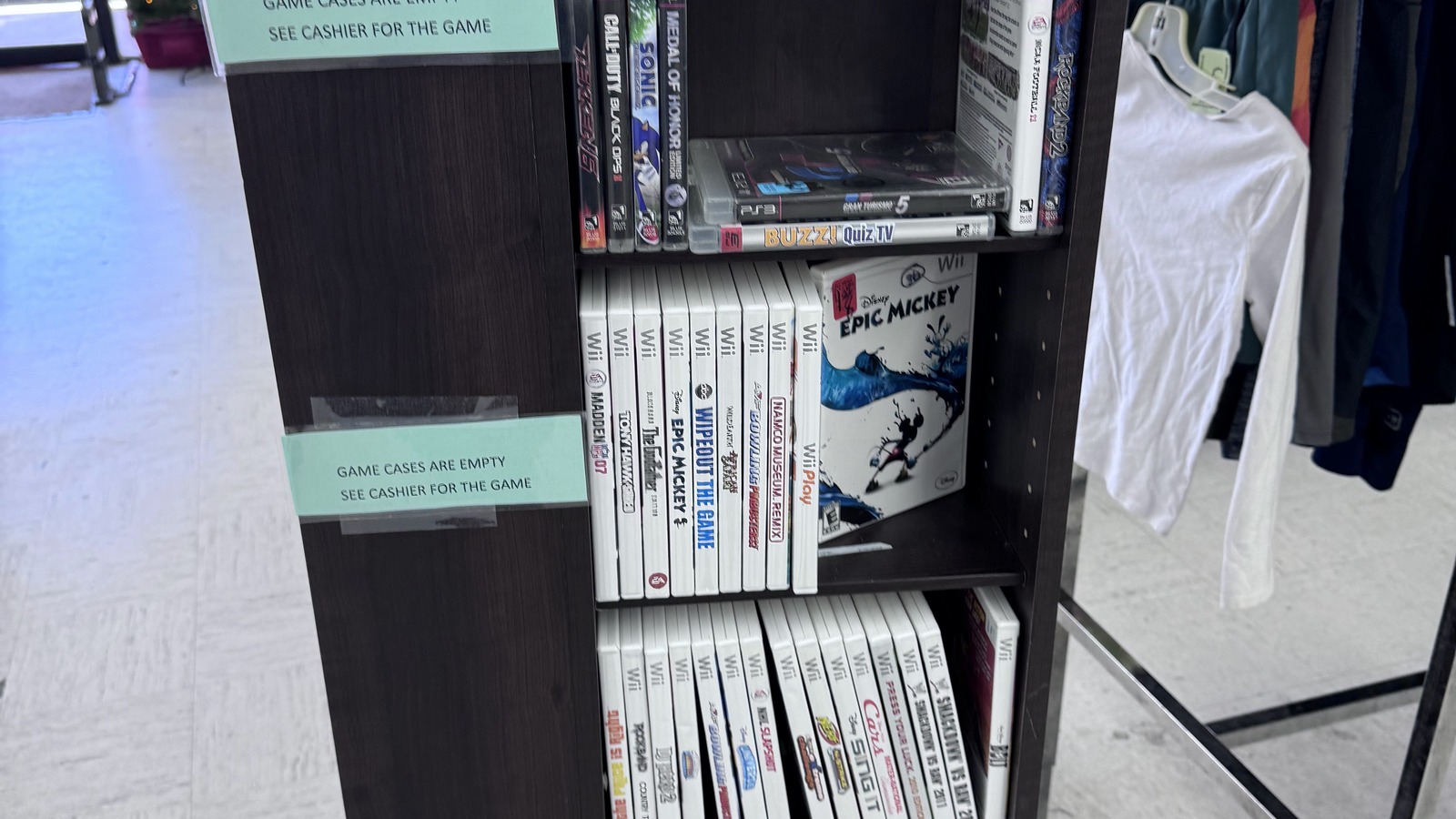 Media and book shelf inside Community Thrift Store near Orlando