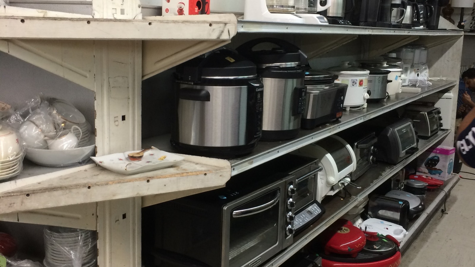 Small appliances and kitchen gear inside Community Thrift Store
