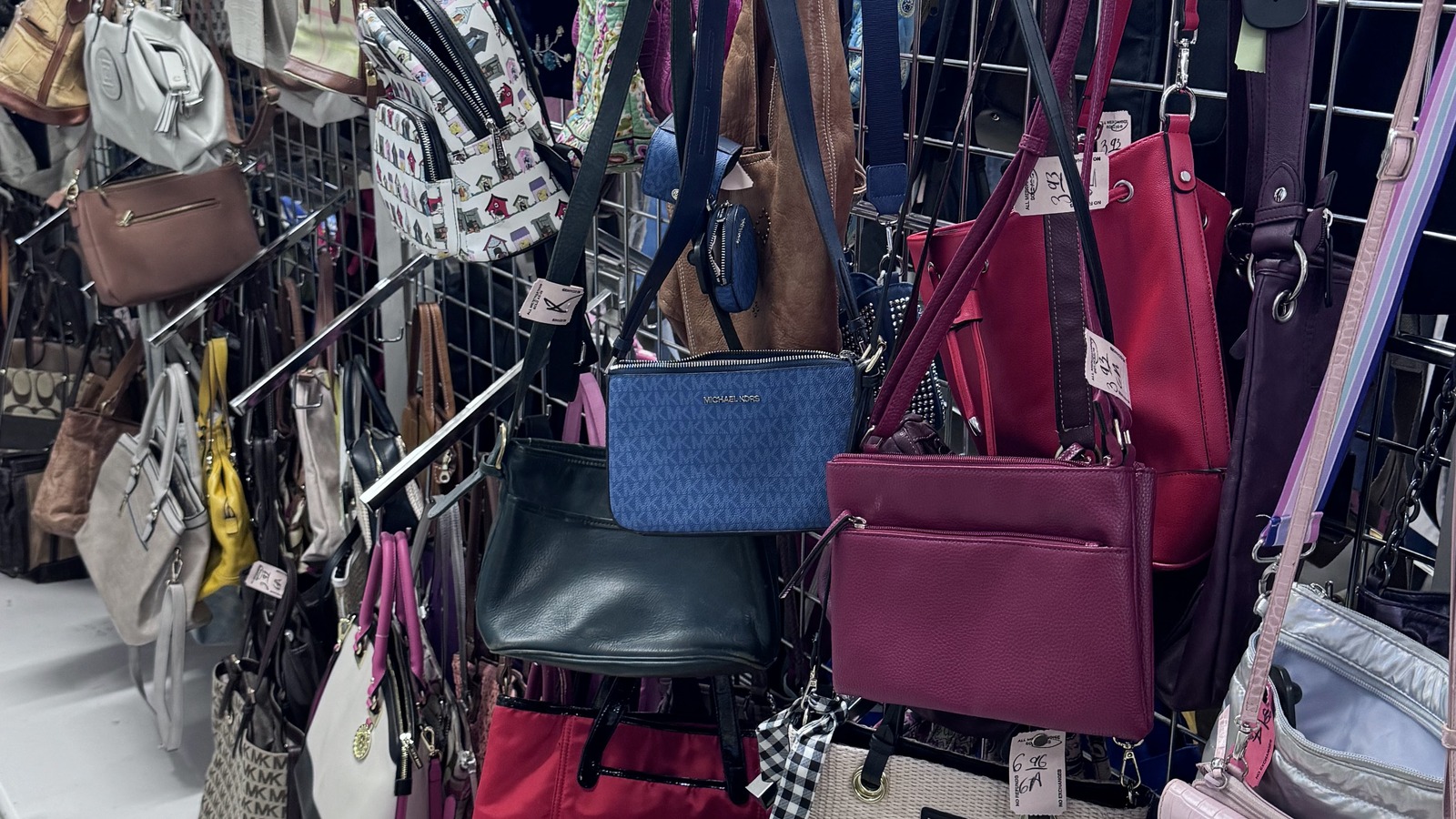 Colorful purse wall inside Community Thrift Store near Orlando