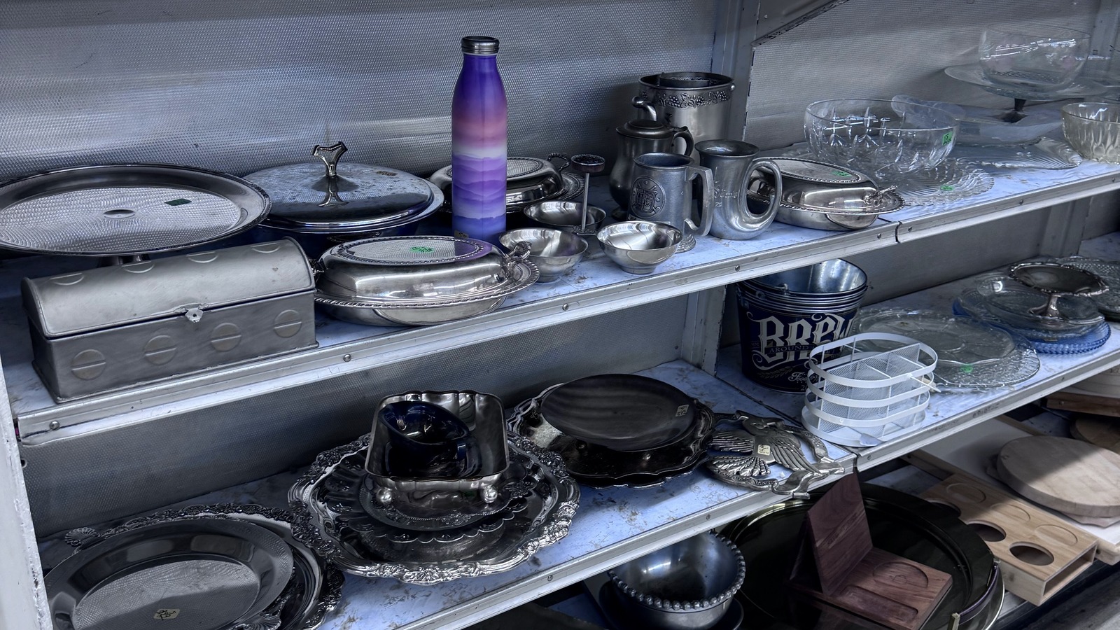 Kitchenware shelves inside Community Thrift Store near Orlando