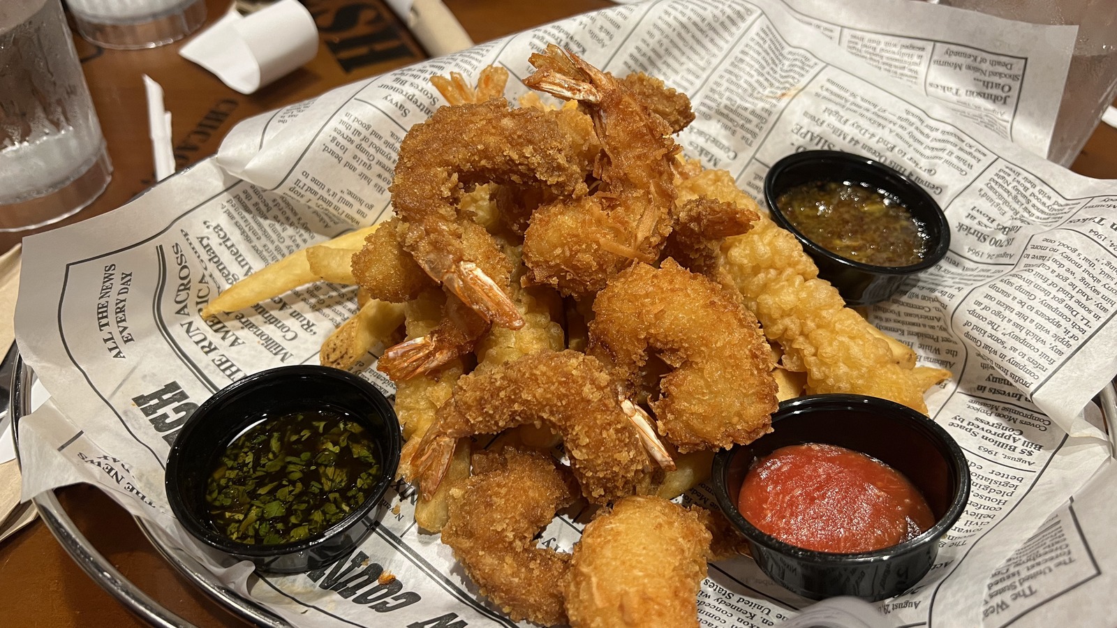 Fried shrimp platter with fries and dipping sauces at Bubba Gump Shrimp Co. Orlando