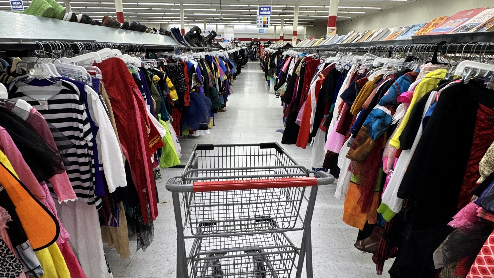 Long clothing aisle inside Texas Thrift Store in Harlingen
