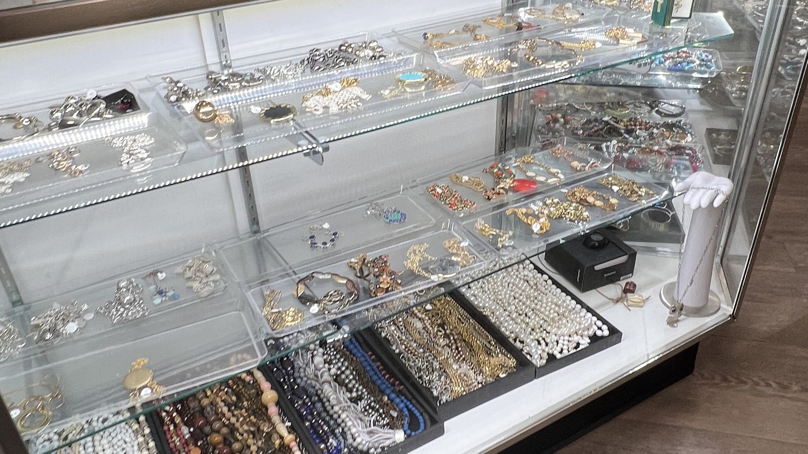 Jewelry case inside Dorcas Thrift Shop in Cary