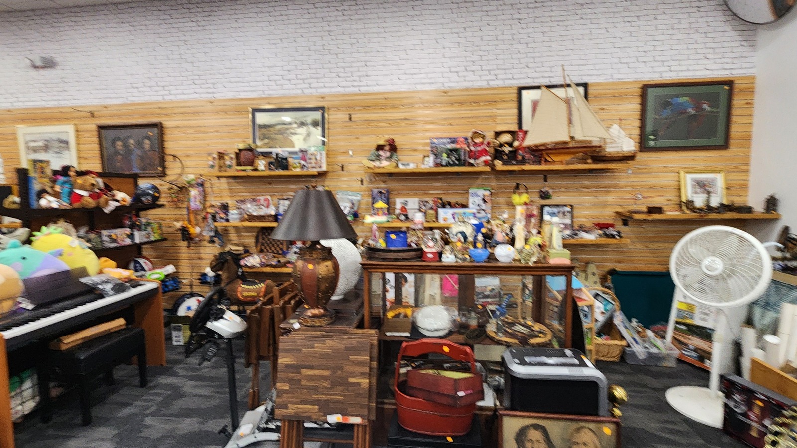 Decor displays across the sales floor inside Dorcas Thrift Shop in Cary