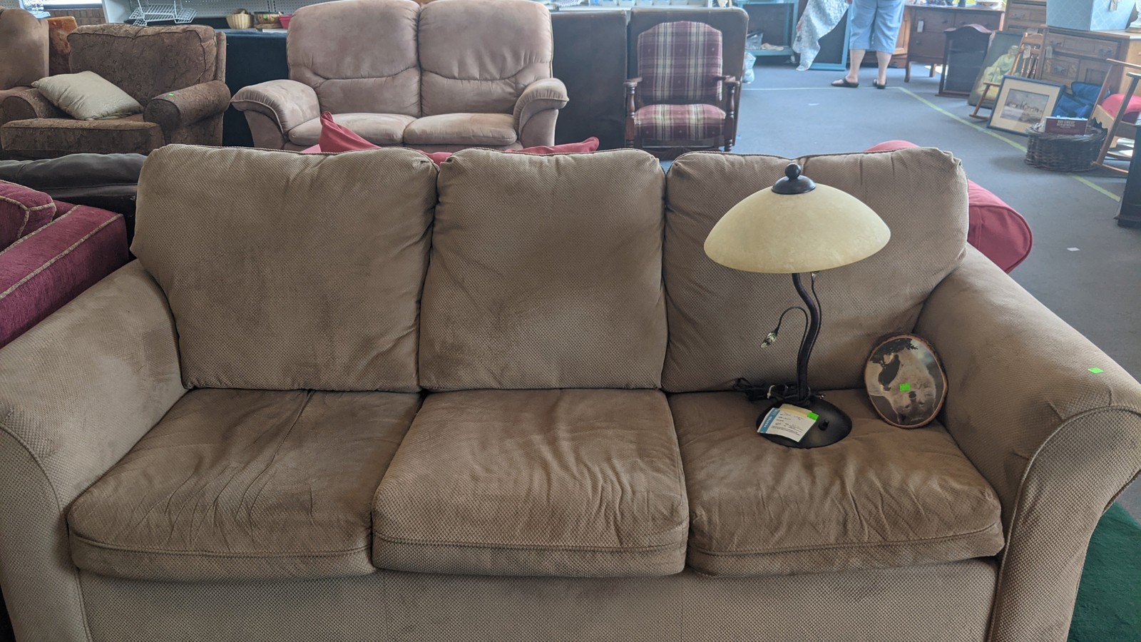 Sofas, lamps, and furniture arranged across the sales floor at Fort Collins Habitat For Humanity ReStore