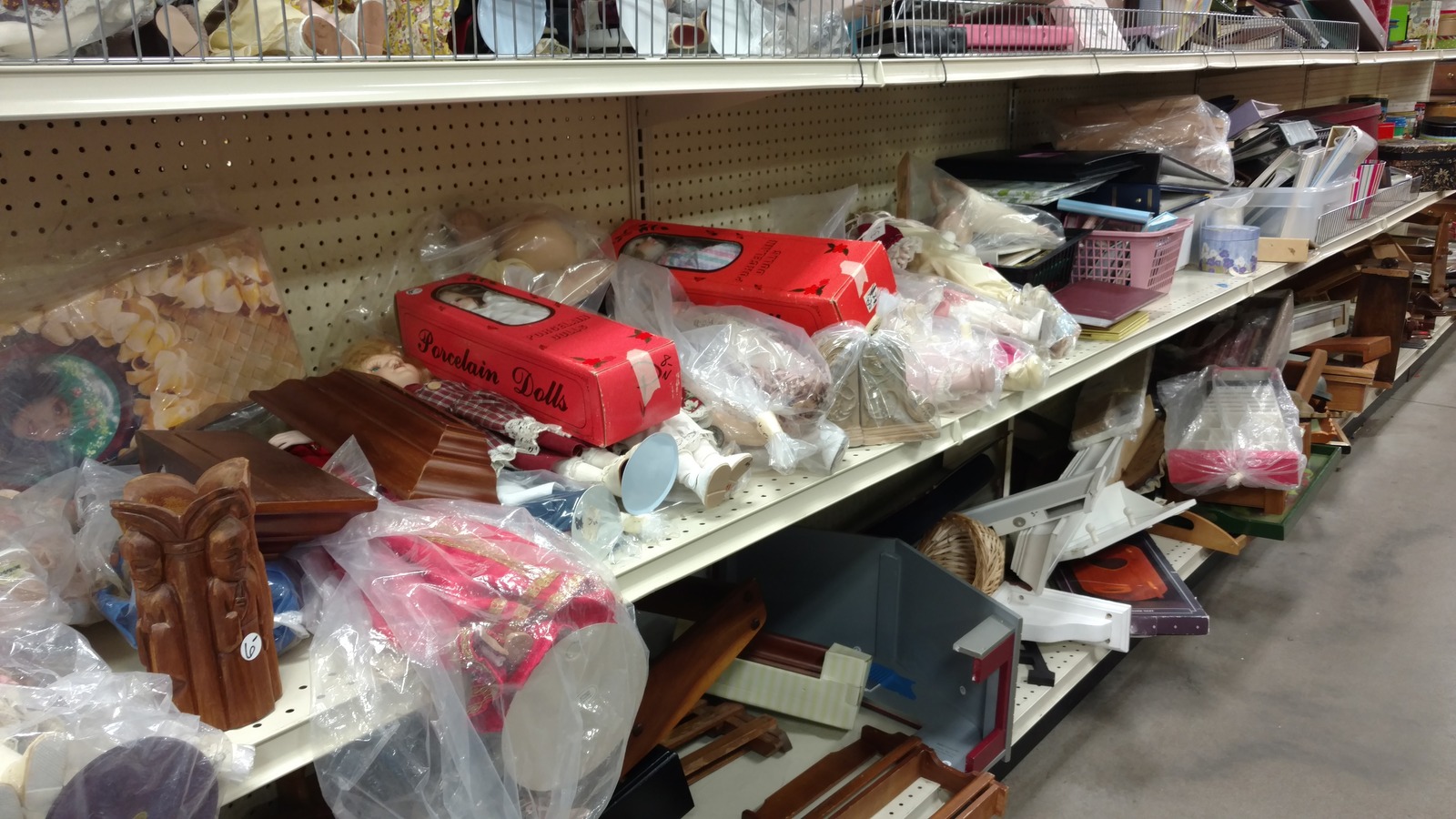 Shelves of housewares and decor inside St. Vincent de Paul Thrift Store and Donation Center in Cincinnati