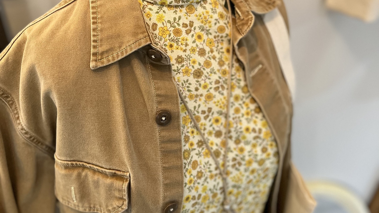 Secondhand shopping scene at October House Vintage & Consignment in Buffalo