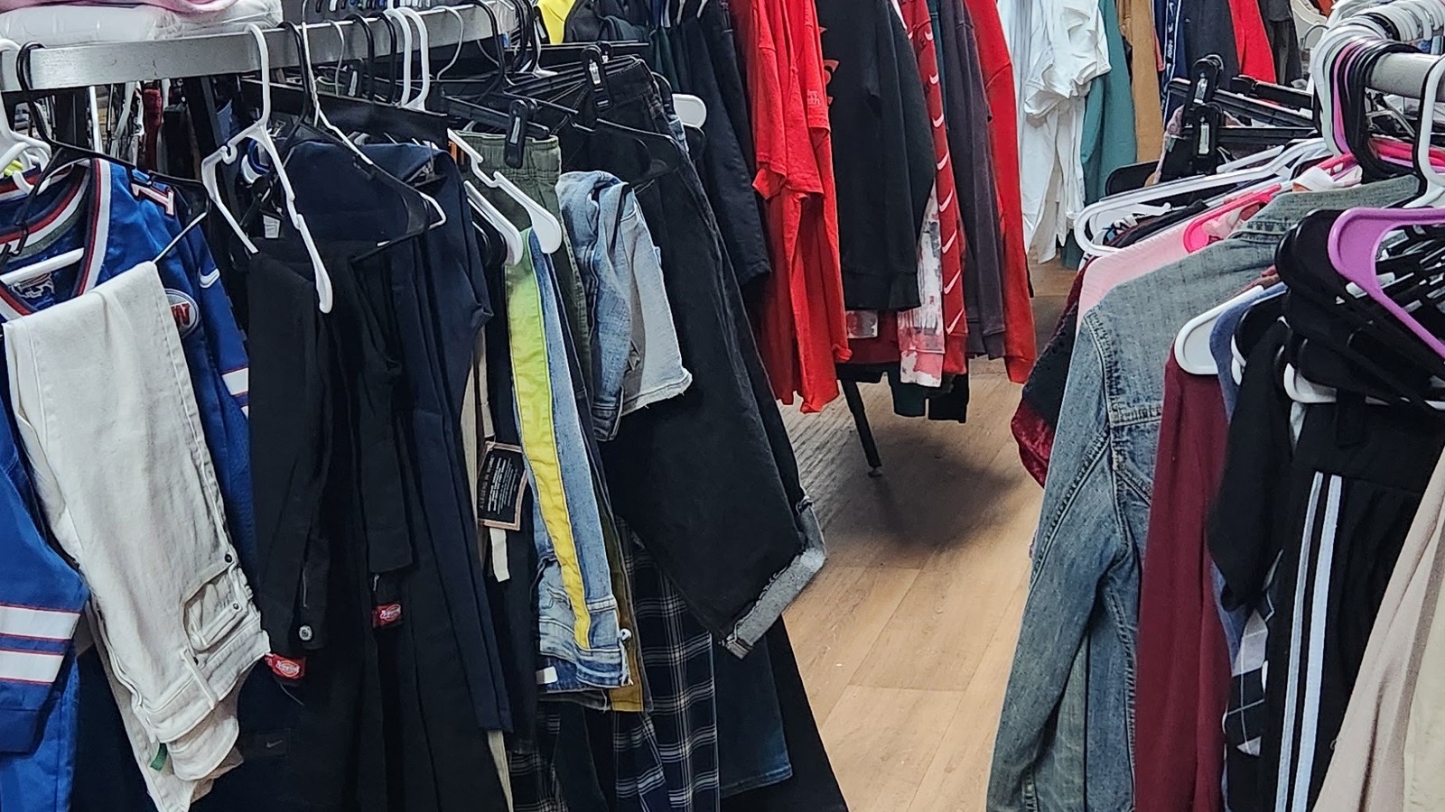Secondhand shopping scene at Main Street thrift store in Buffalo