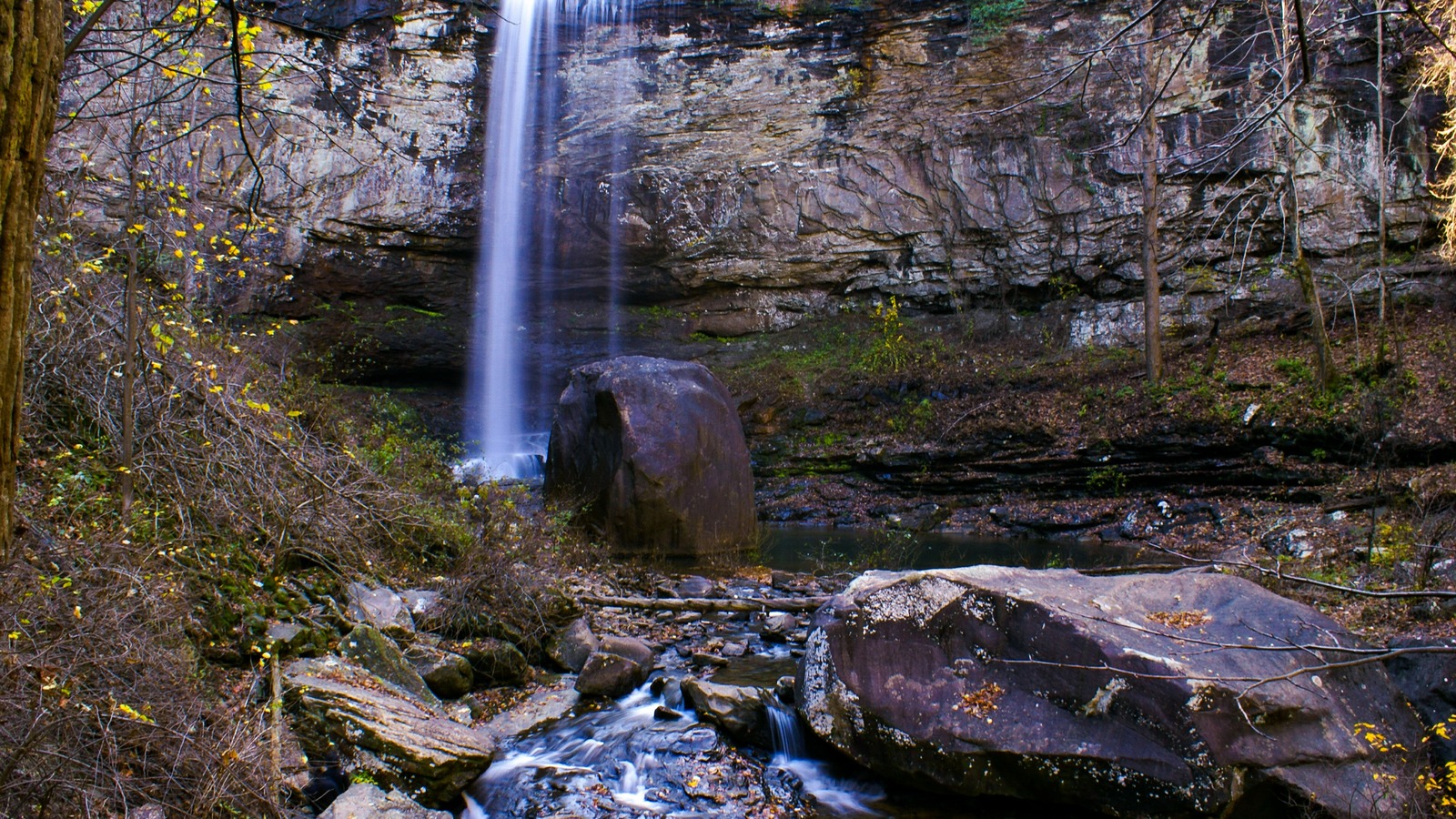 Hemlock Falls and its boulder-lined pool in late-season light at Cloudland Canyon State Park.