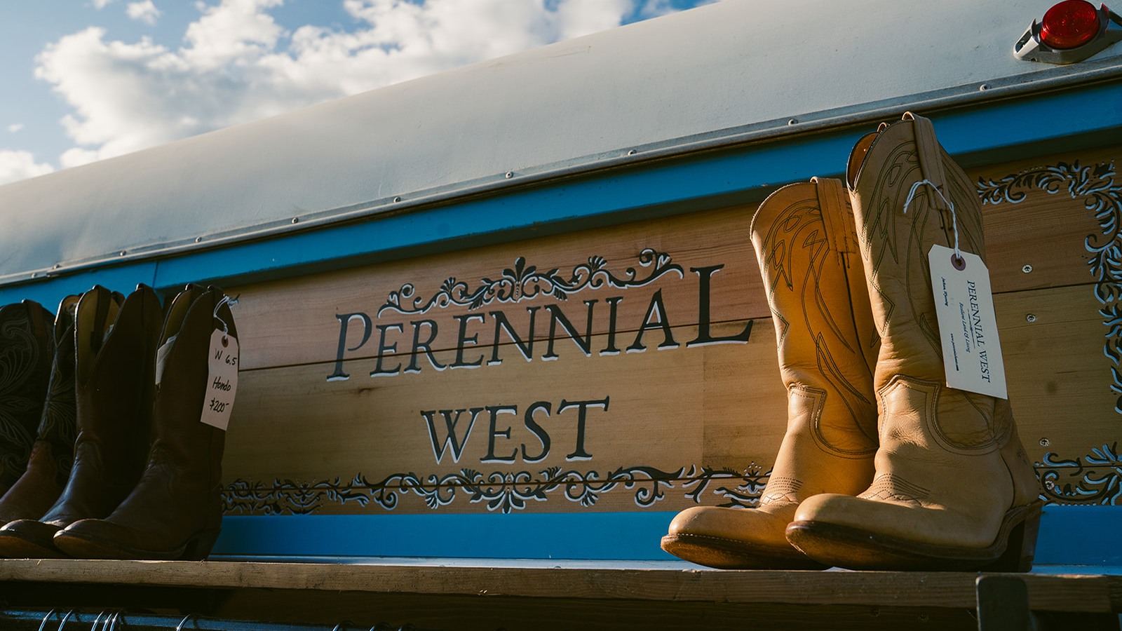 Western boots displayed in the Perennial West storefront in Jackson Wyoming