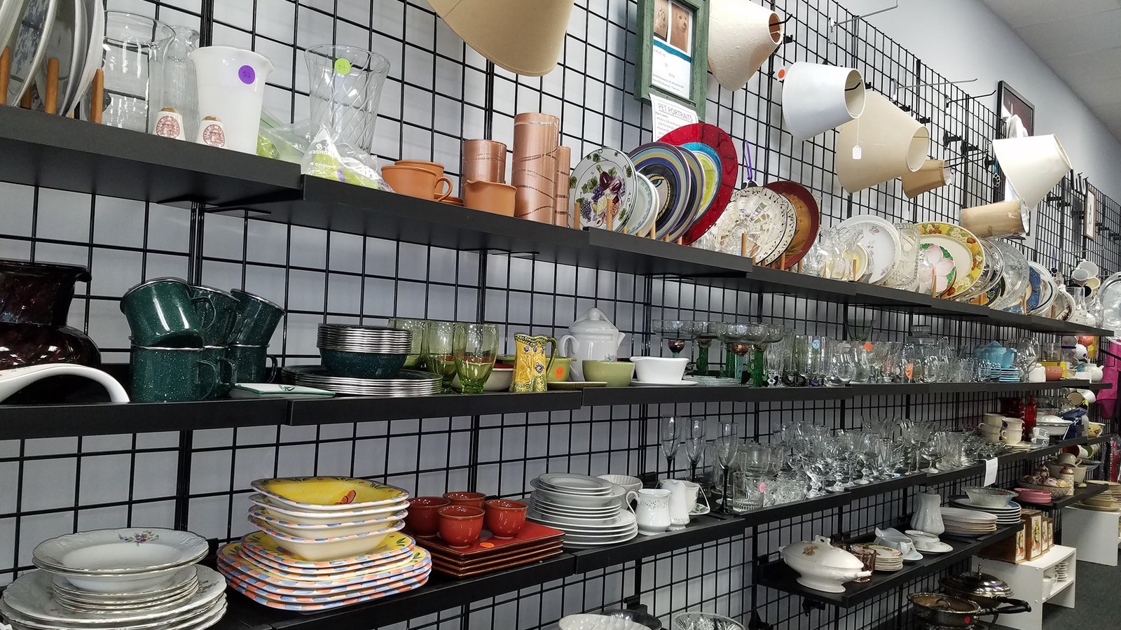 Colorful dishes and glassware at Humane Educational Society Boutique and Thrift in Chattanooga