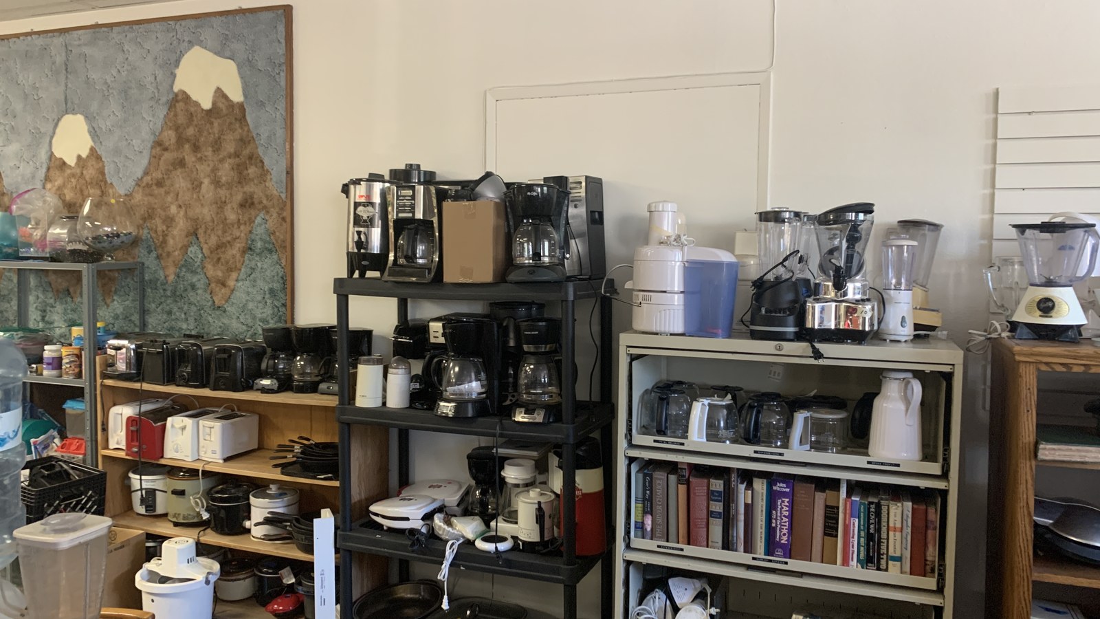 Kitchen appliances books and home goods at E Street Thrift Store in Pendleton Oregon
