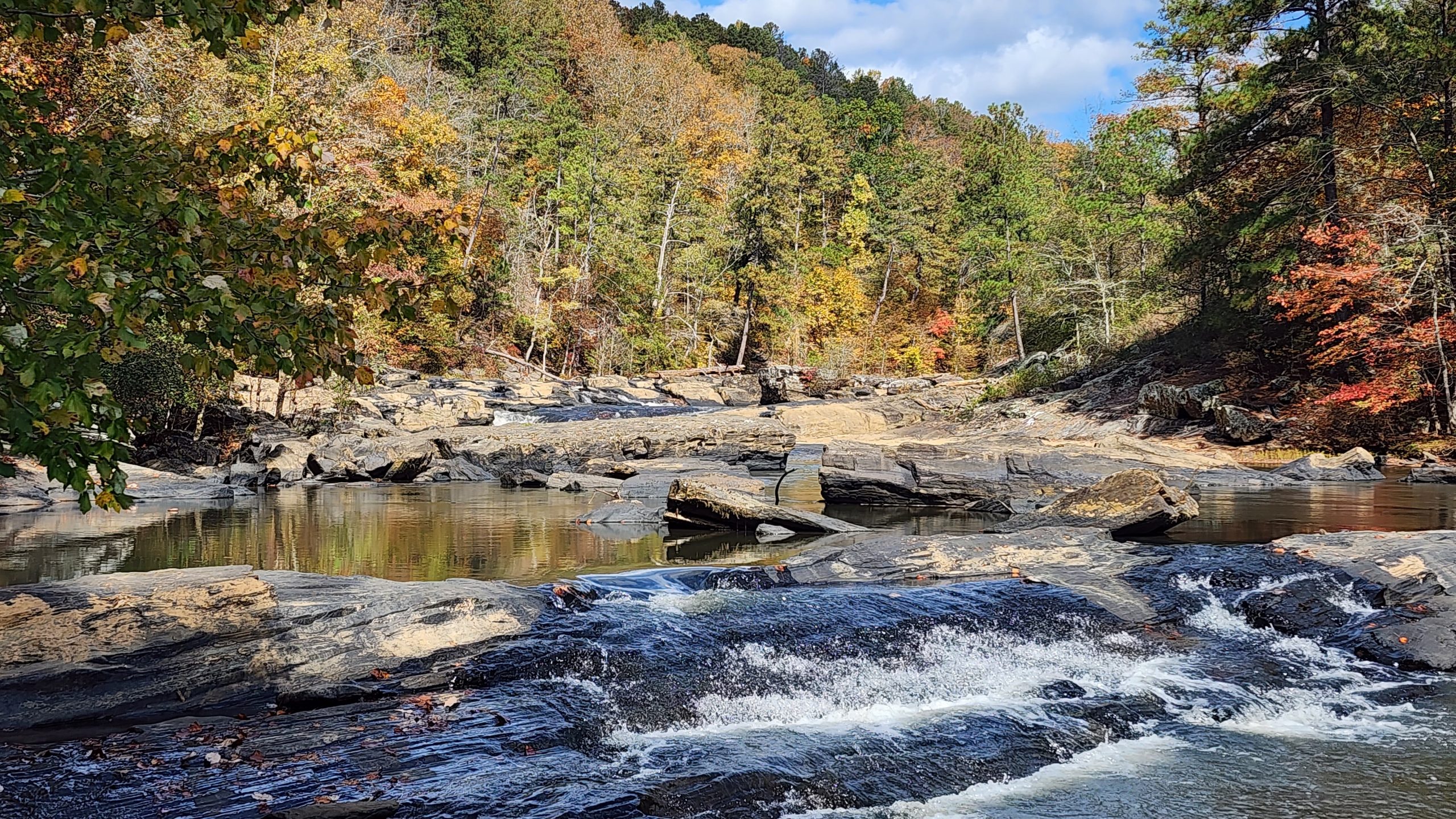 Flat rock shoals and autumn color at Sweetwater Creek State Park