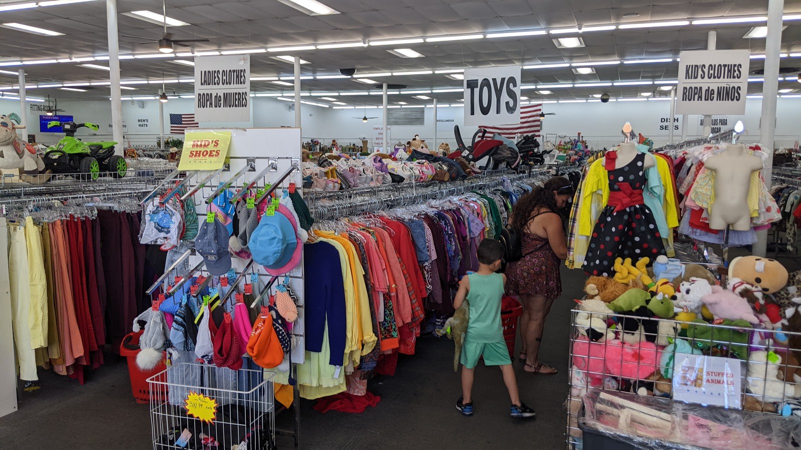 Children's clothing racks and toy bins at American Thrift Store in Hollywood