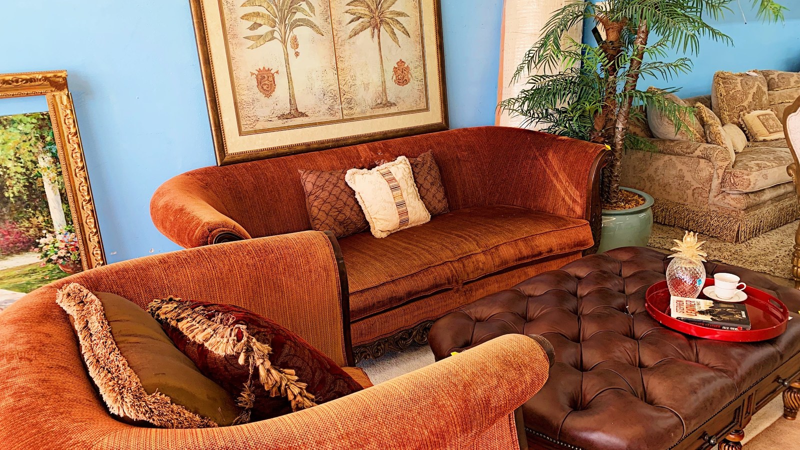 Orange living room seating and coffee table at American Thrift Store in Hollywood