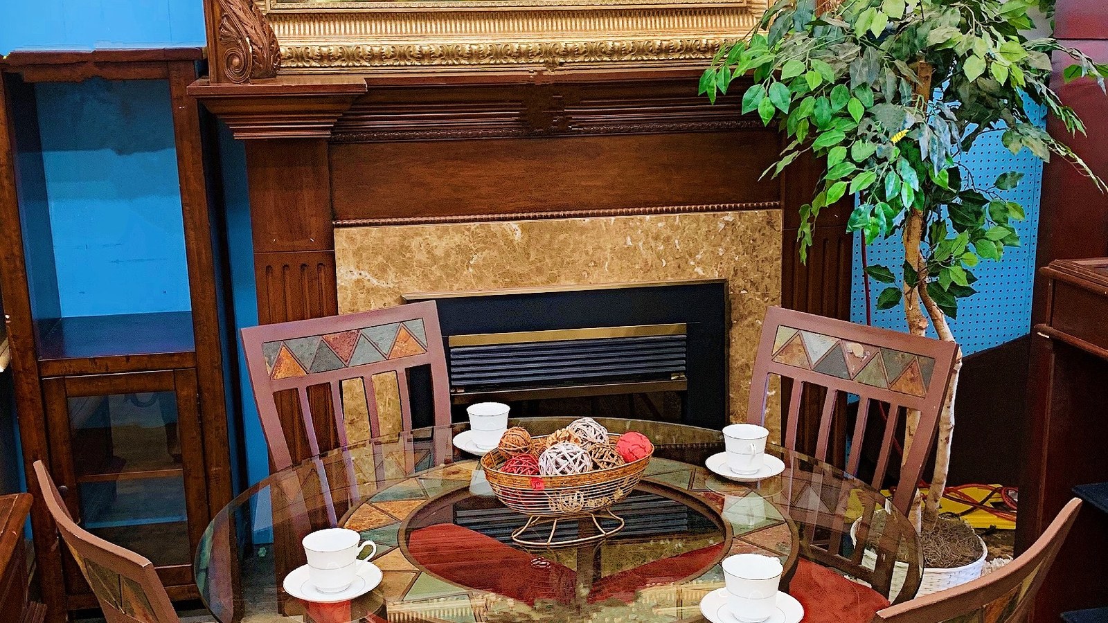 Fireplace surround and dining display at American Thrift Store in Hollywood