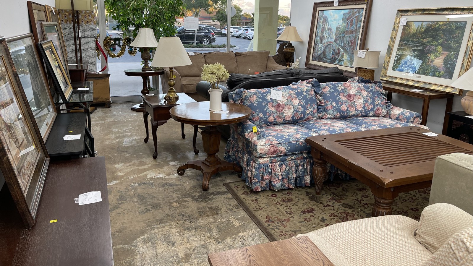 Framed art and furniture vignette at American Thrift Store in Hollywood