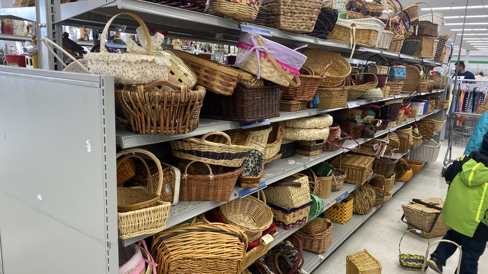 Shelves filled with woven baskets at 2nd Ave Thrift Store in Laurel