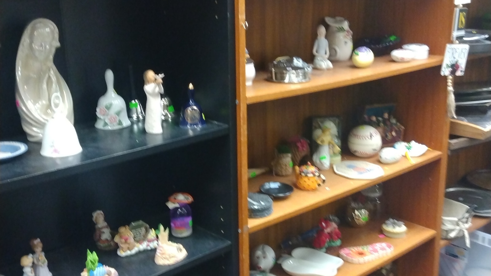 Ceramic figurines and small collectibles displayed at New Life Thrift in Glenside