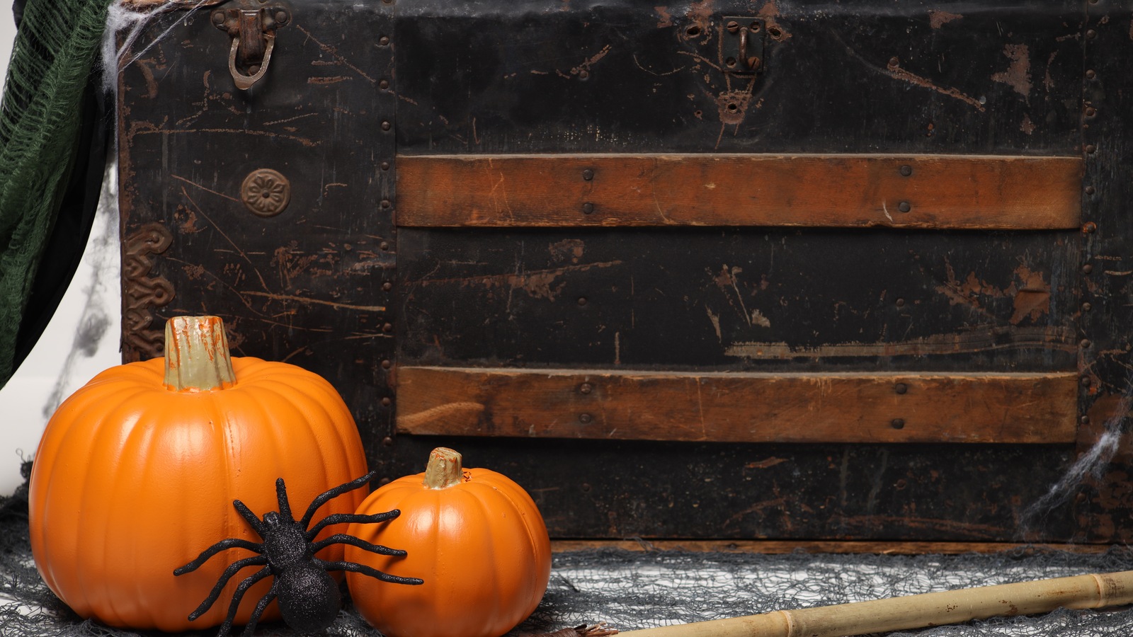 Vintage trunk and pumpkins in a seasonal display at America's Thrift Store