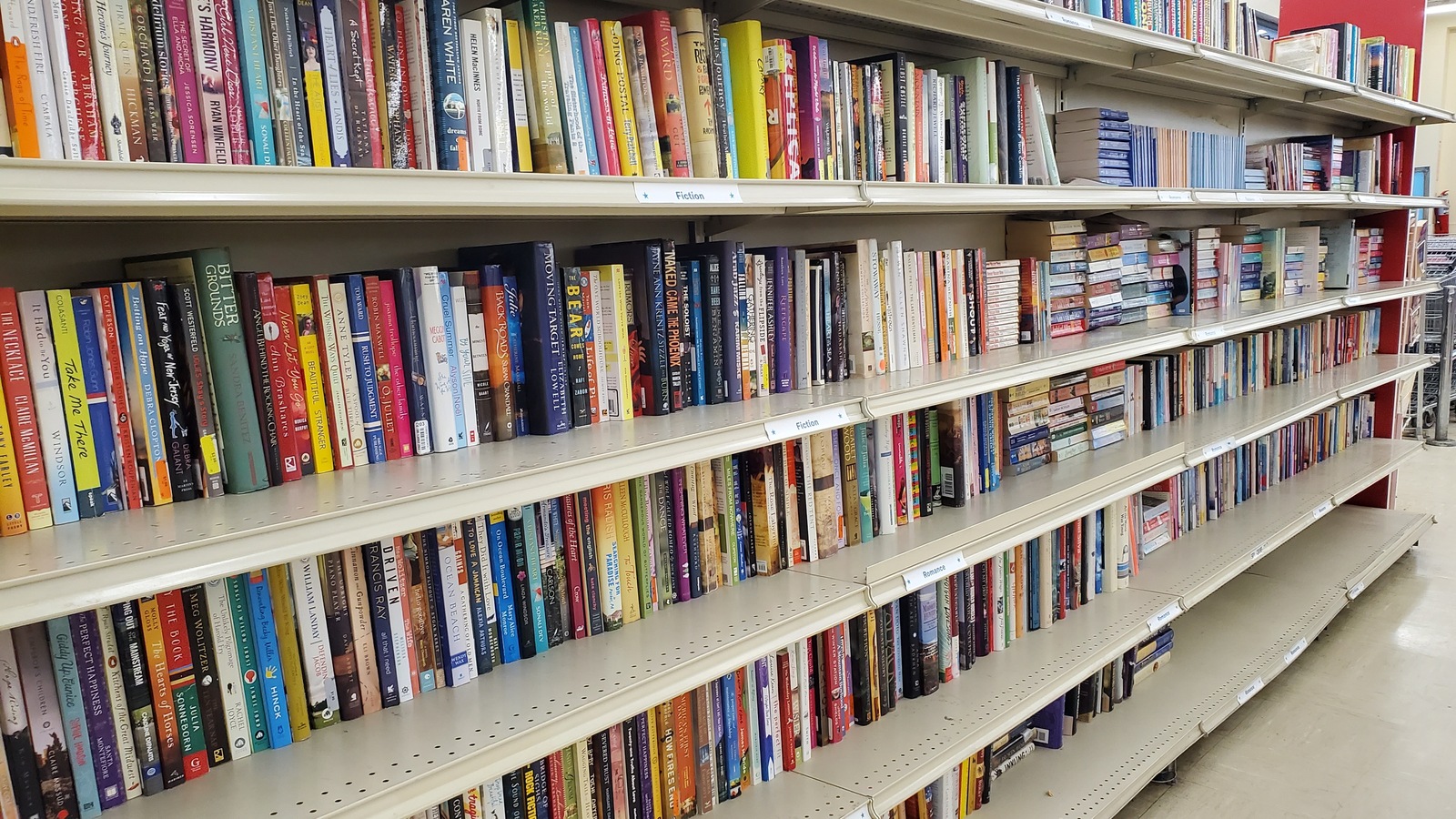 Long shelves filled with secondhand books in the Jasper store