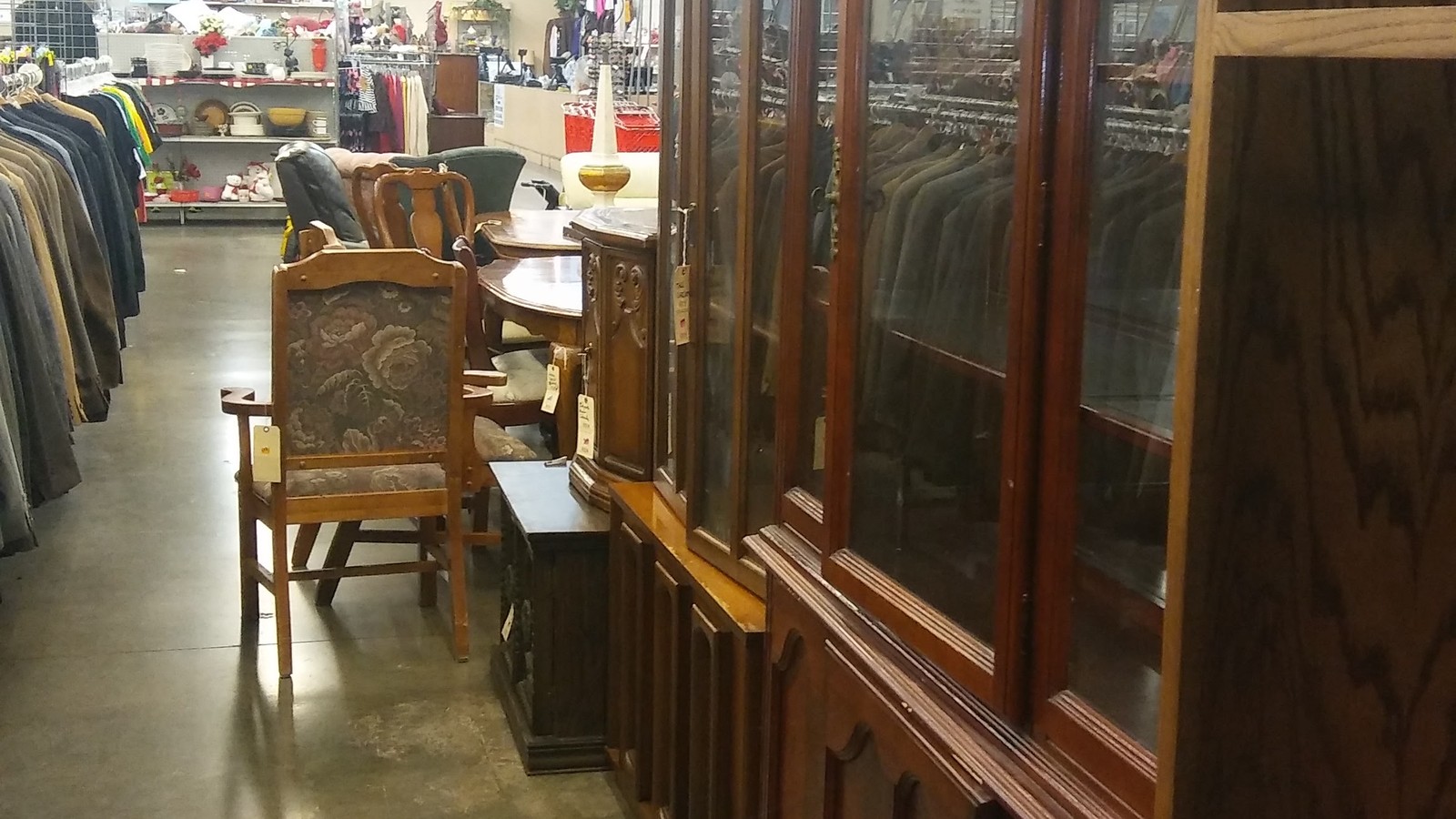 Wood furniture aisle at ACTS Thrift Store in Pasadena