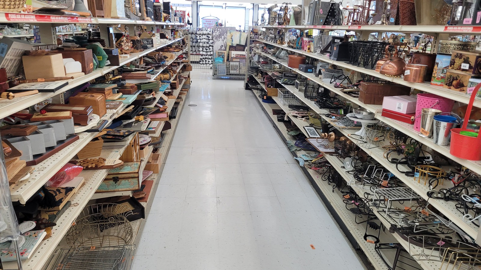 Long housewares aisle at ARC Thrift Store in Thornton