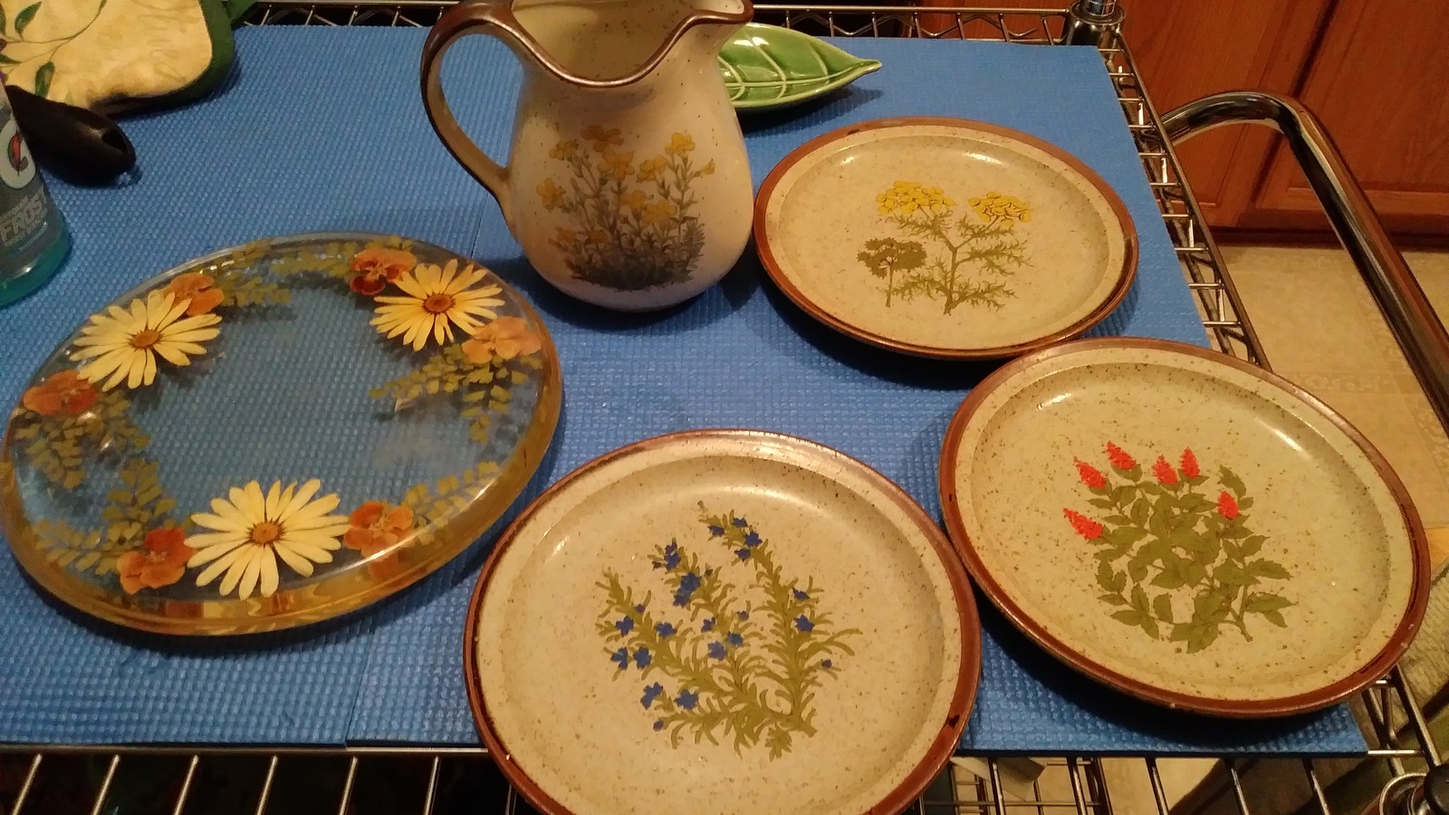Floral stoneware plates and pitcher at ARC Thrift Store